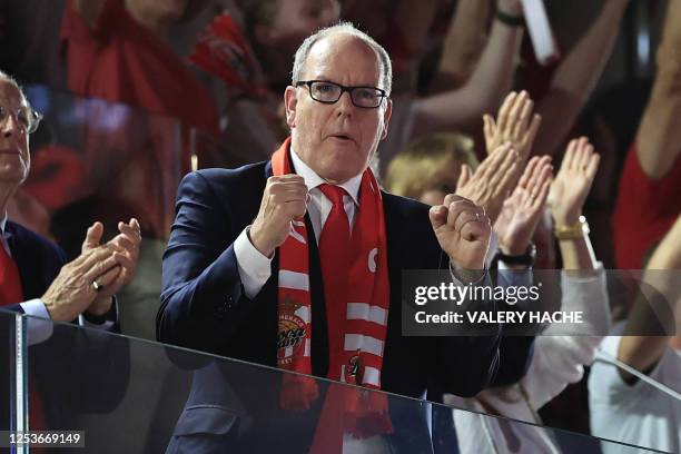 Prince Albert II of Monaco reacts as he follows the game during the Euroleague quarter final basketball match 5 between AS Monaco and Maccabi Tel...