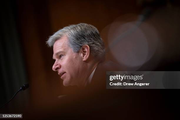 Director Christopher Wray testifies during a Senate Appropriations Subcommittee on Commerce, Justice, Science, and Related Agencies hearing on...