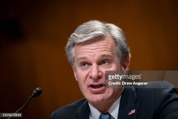Director Christopher Wray testifies during a Senate Appropriations Subcommittee on Commerce, Justice, Science, and Related Agencies hearing on...
