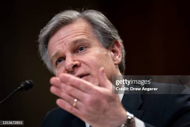 Director Christopher Wray testifies during a Senate Appropriations Subcommittee on Commerce, Justice, Science, and Related Agencies hearing on...