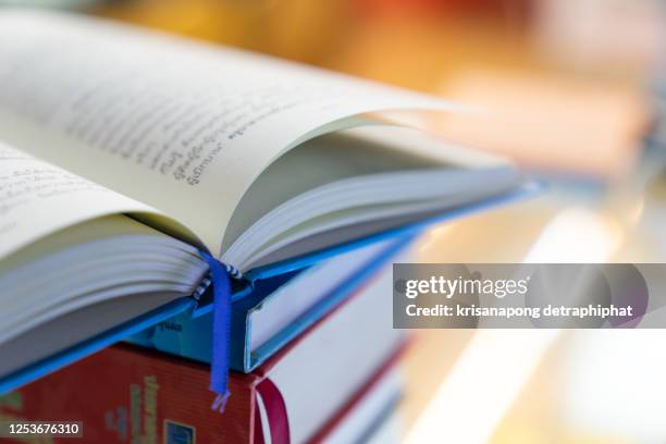 book,book stack in the library room,education concept - science photo library photos et images de collection