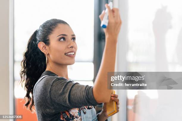 university students in classroom - initiative stock pictures, royalty-free photos & images