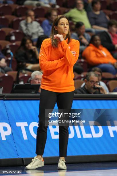 Head Coach Stephanie White of the Connecticut Sun looks on during the game during the preseason game on May 10, 2023 at the Mohegan Sun Arena in...