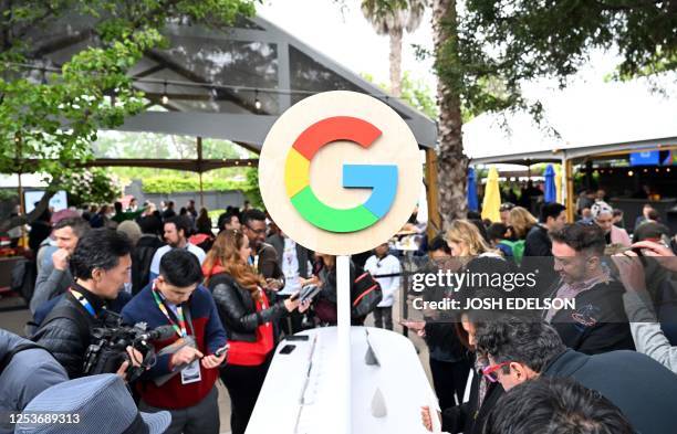 Members of the media view new Google products in a media area during the Google I/O event at Shoreline Amphitheatre in Mountain View, California, on...