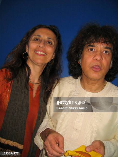 World renowned tabla player Zakir Hussain and his wife, Antonia Minnecola, attend Ismail Merchant's funeral on May 25, 2005 in New York City.