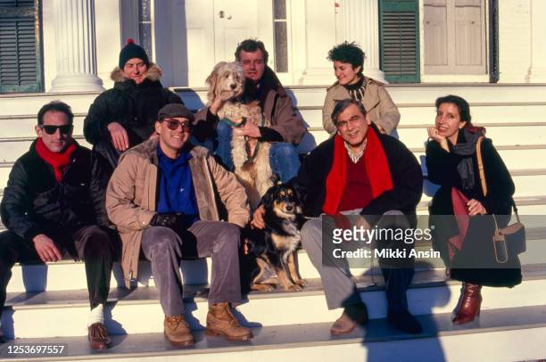 Merchant Ivory principals and colleagues sit on the steps of their house in Claverack NY. Top row: Director James Ivory, and composer Richard Robbins...