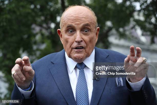 President Donald Trump's lawyer and former New York City Mayor Rudy Giuliani talks to journalists outside the White House West Wing July 01, 2020 in...