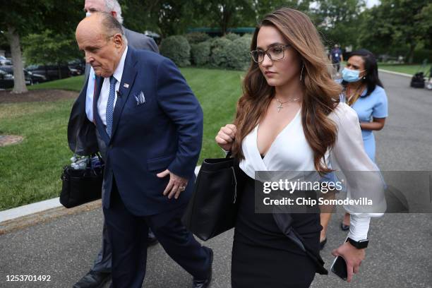 Accompanied by his communications director Christianne Allen , President Donald Trump's lawyer and former New York City Mayor Rudy Giuliani leaves...