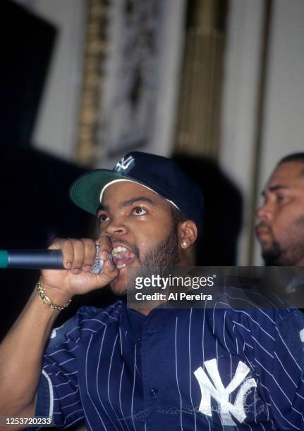 Rapper Ice Cube performs in a New York Yankees Starter brand jersey and cap at The Apollo Theater on February 22, 1992 in New York City.