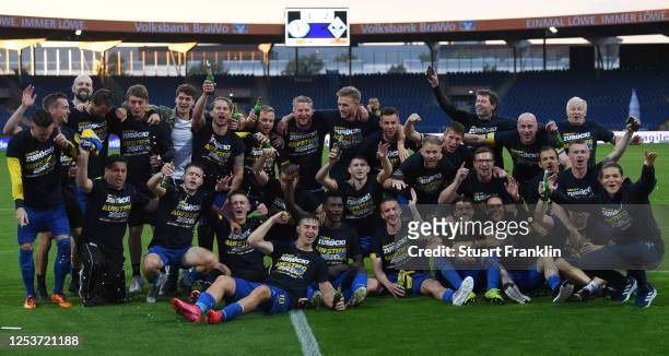The players of Braunschweig celebrates promotion to the second Bundesliga after the 3. Liga match between Eintracht Braunschweig and SV Waldhof...