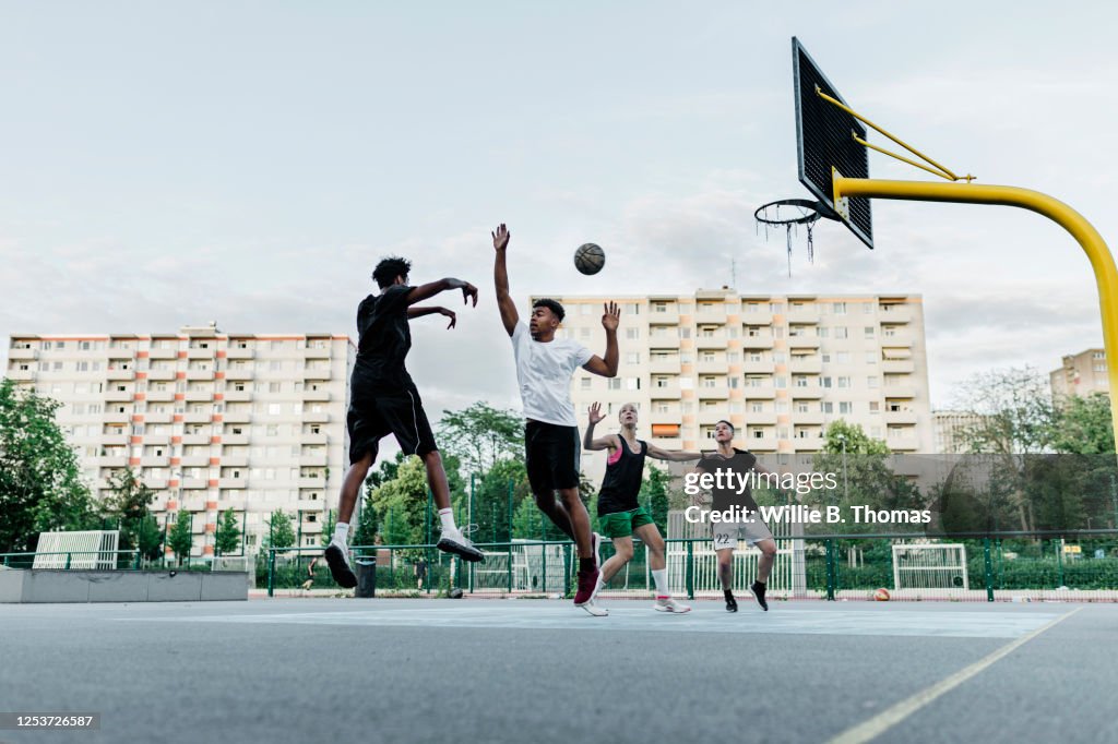 Friends playing Basketball