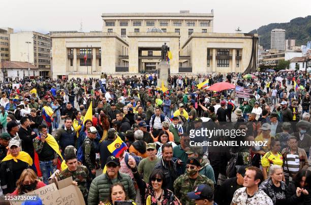 Former military and police officers gather at Bolivar Square to protest against the government of leftist President Gustavo Petro and to demand...