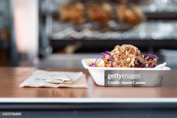 roast chicken and salad on biodegradable paper plate on food truck counter - auckland food bildbanksfoton och bilder
