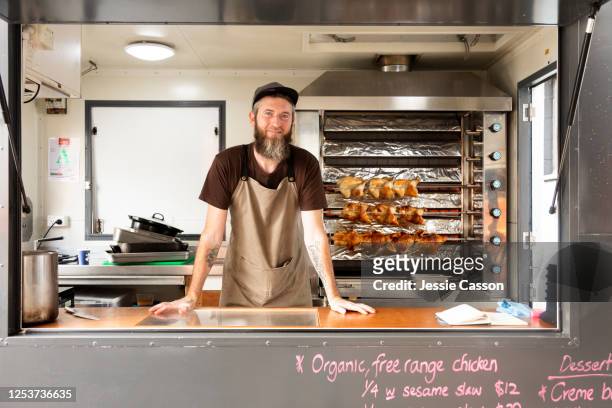 portrait of a man in his food truck - new zealand small business stock pictures, royalty-free photos & images