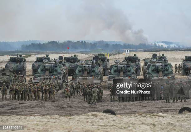 Participants of a high-intensity training session, seen at the end of the exercise at the Nowa Deba training ground on May 06, 2023 in Nowa Deba,...