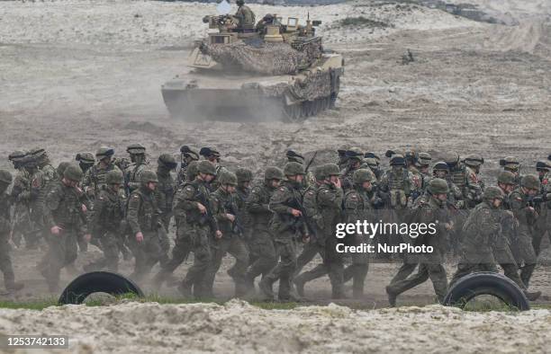 Polish army soldiers are undergoing a high-intensity training session, utilizing M1A2 Abrams tanks at the Nowa Deba training ground on May 06, 2023...