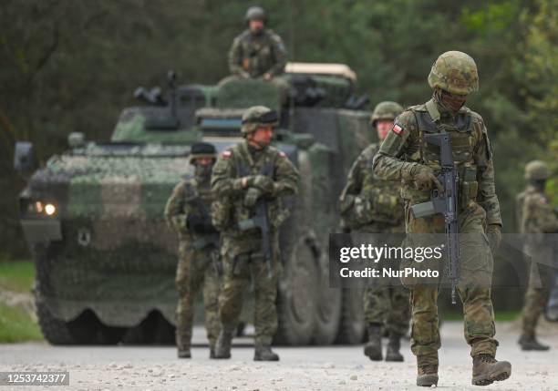 Polish soldiers are seen during a high-intensity training session at the Nowa Deba training ground on May 06, 2023 in Nowa Deba, Poland. Anakonda-23...