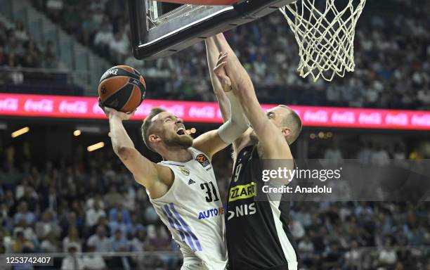 Alen Smailagic of Partizan in action against Dzanan Musa of Real Madrid during the Turkish Airlines EuroLeague playoff round fifth basketball match...
