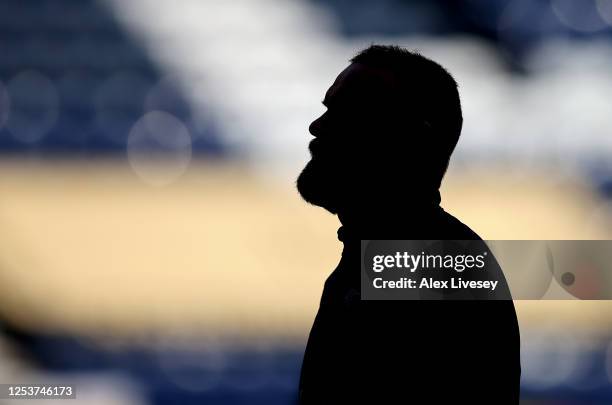 Wayne Rooney of Derby County looks on during the warm up prior to the Sky Bet Championship match between Preston North End and Derby County at...