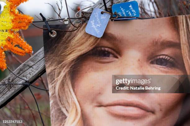 Banner showing the face of Tylee Ryan is seen on a fence set up as a memorial near where her body was found on May 10, 2023 in Rexburg, Idaho. Lori...