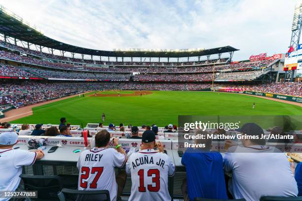 Fans sitting in the Chop House during the game between the Atlanta Braves and the Boston Red Sox at Truist Park on May 10, 2023 in Atlanta, Georgia.