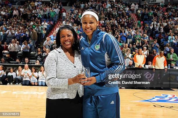 President Laurel Richie presents Maya Moore of the Minnesota Lynx with her 2011 WNBA Rookie of the Year Award in Game One of the Western Conference...