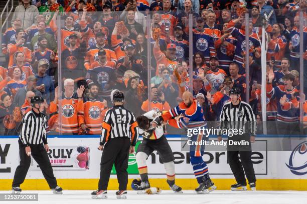 Darnell Nurse of the Edmonton Oilers fights Nicolas Hague of the Vegas Golden Knights in the third period of Game Four of the Second Round of the...