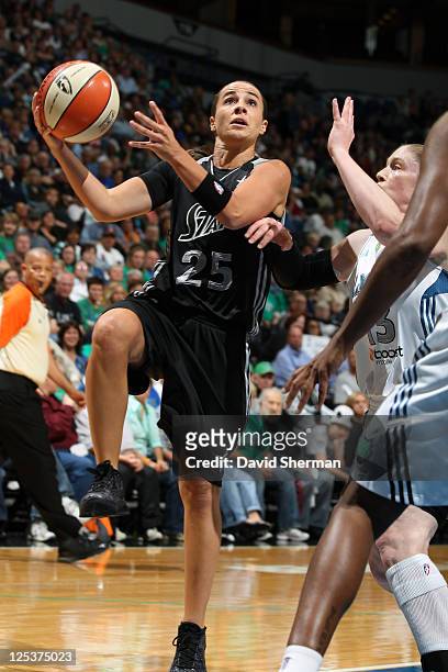 Lindsay Whalen of the Minnesota Lynx defends against Becky Hammon of the San Antonio Silver Stars in Game One of the Western Conference Semifinals...