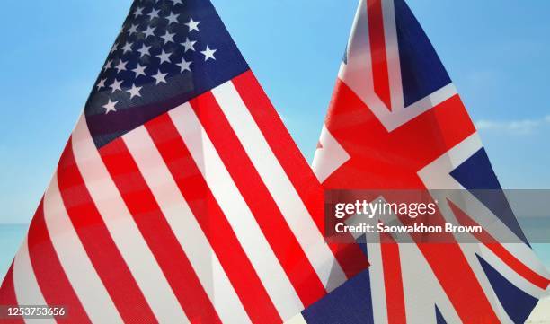 usa and uk flag together background - democracy uk stock pictures, royalty-free photos & images