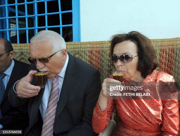 Czech Republic Vaclav Klaus and his wife Livia Klausova drink tea with pine nuts at the famous Cafe des Nates in Sidi Boussaid village on April 17,...