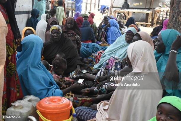 Nigerian women are seen with their children at the Gwoza IDP Camp in Borno State, Nigeria on May 03, 2023. While the number of people displaced and...