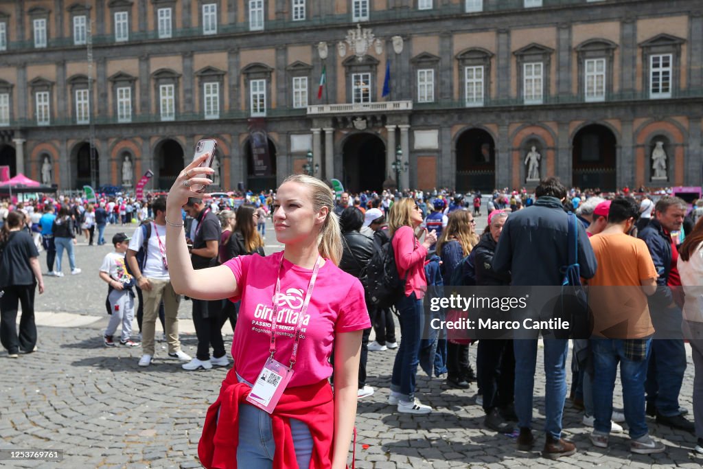 A girl, with a Giro d'Italia t-shirt takes a selfie in...