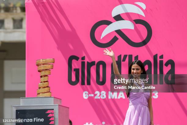 Girl on stage presents the Giro d'Italia trophy cup, in Plebiscito square, during the six stage of the 106th Giro d'Italia 2023, 162 km between...