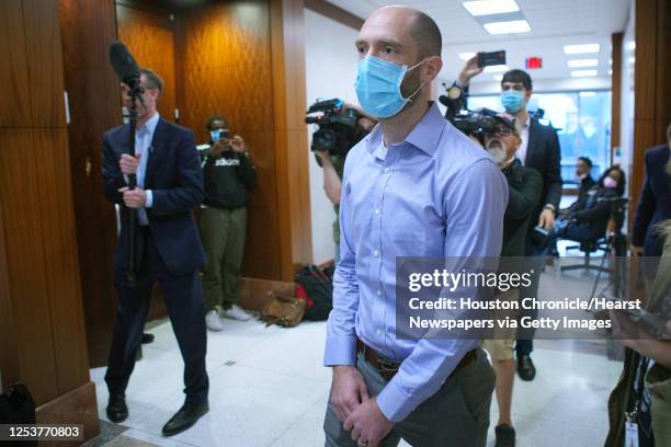 Aaron Dunn leaves the courtroom after COVID contract indictments were handed down Tuesday, April 12, 2022 in Houston. Two aides to Harris County...