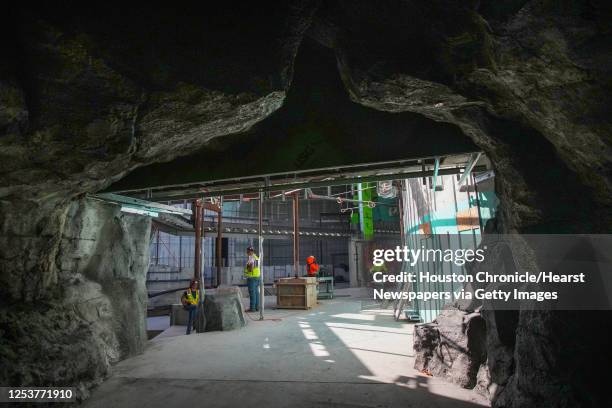 Workers continue construction in the penguin exhibit at the Houston Zoo's Galapagos Islands Thursday, June 23, 2022 in Houston. The Houston Zoo's...