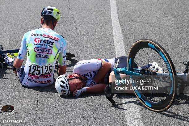 Astana Qazaqstan Team's British rider Mark Cavendish falls on the Valico di Chiunzi during the sixth stage of the Giro d'Italia 2023 cycling race,...