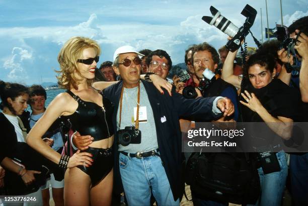 Eva Herzigova and Helmut Newton attend the 49th Cannes film Festival in May 1996, in Cannes, France.