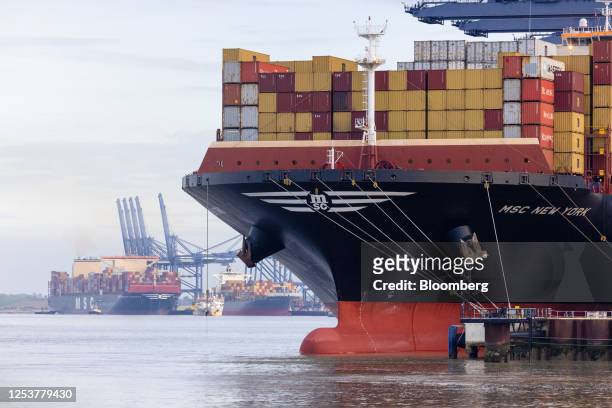 The MSC New York, right, and the MSC Celestino Maresca container ships at the Port of Felixstowe, owned by a unit of CK Hutchison Holdings Ltd., in...