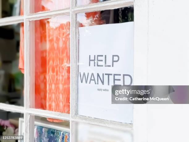 retail business help wanted sign posted amid ongoing covid-19 crisis - wanted stock pictures, royalty-free photos & images