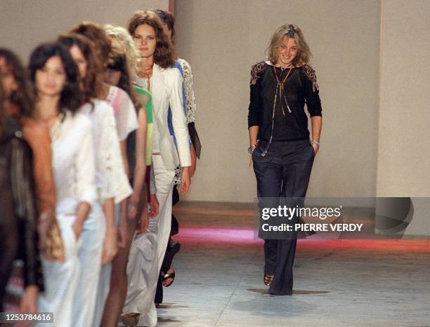 British designer Phoebe Philo acknowledges the audience after her first show for Stella McCartney's label, Chloe 10 October 2001 during the...