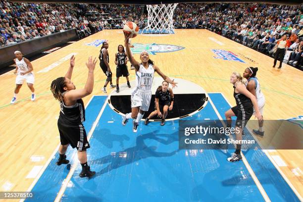 Candice Wiggins of the Minnesota Lynx leaps for the basket against the San Antonio Silver Stars in Game One of the Western Conference Semifinals...