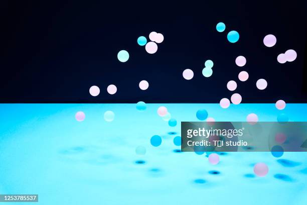 a lot of color balls in motion. - dedication stock pictures, royalty-free photos & images