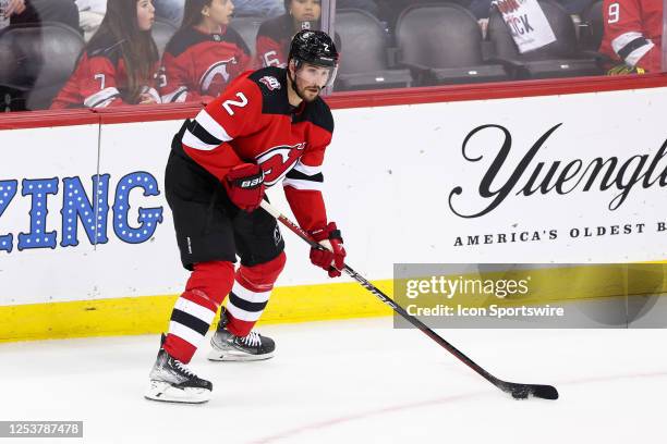 New Jersey Devils defenseman Brendan Smith skates with the puck during Game 4 of an Eastern Conference Second Round playoff game between the Carolina...