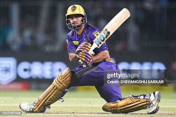 Kolkata Knight Riders' Shardul Thakur plays a shot during the Indian Premier League Twenty20 cricket match between Kolkata Knight Riders and...