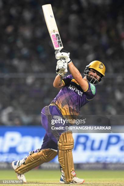 Kolkata Knight Riders' Rinku Singh plays a shot during the Indian Premier League Twenty20 cricket match between Kolkata Knight Riders and Rajasthan...