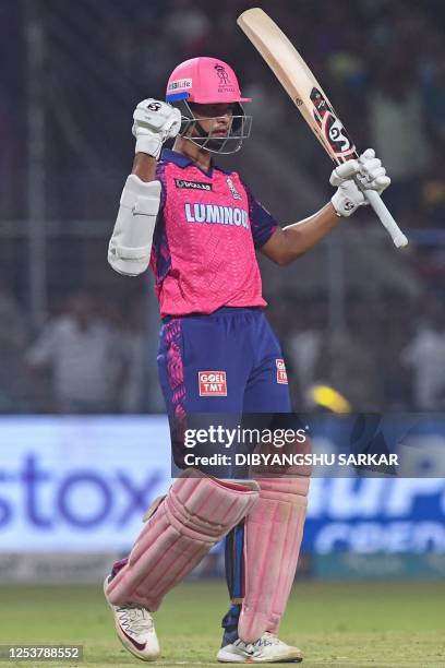 Rajasthan Royals' Yashasvi Jaiswal celebrates after scoring a half-century during the Indian Premier League Twenty20 cricket match between Kolkata...