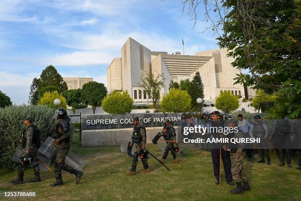 Paramilitary soldiers cordon off the Supreme Court after arrival of Pakistan's former Prime Minister Imran Khan in Islamabad on May 11, 2023....