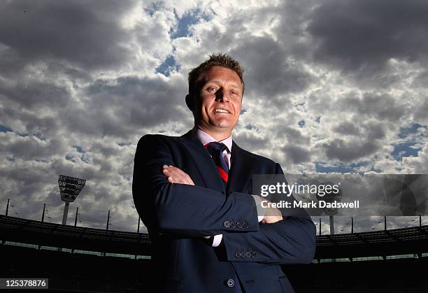 Mark Neeld poses for the media after being announced as the new coach of the Melbourne Football Club at a press conference at the Melbourne Cricket...