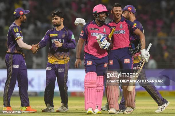 Rajasthan Royals' Yashasvi Jaiswal and Sanju Samson celebrate after winning the Indian Premier League Twenty20 cricket match between Kolkata Knight...