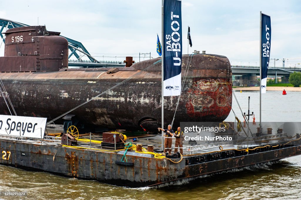 The German Navy's U17 submarine loaded onto a floating pontoon,... News